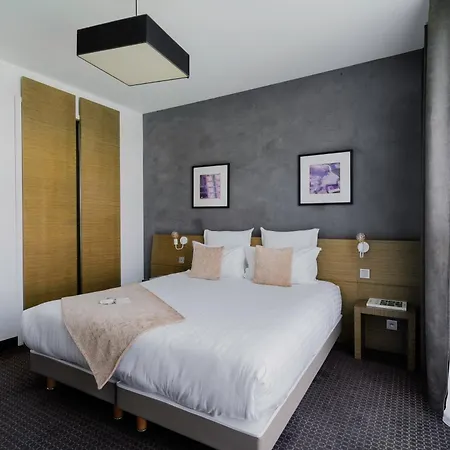 Western De La Cite & Hotell